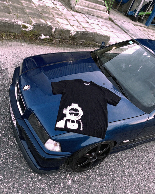 Strapped AIM tee
